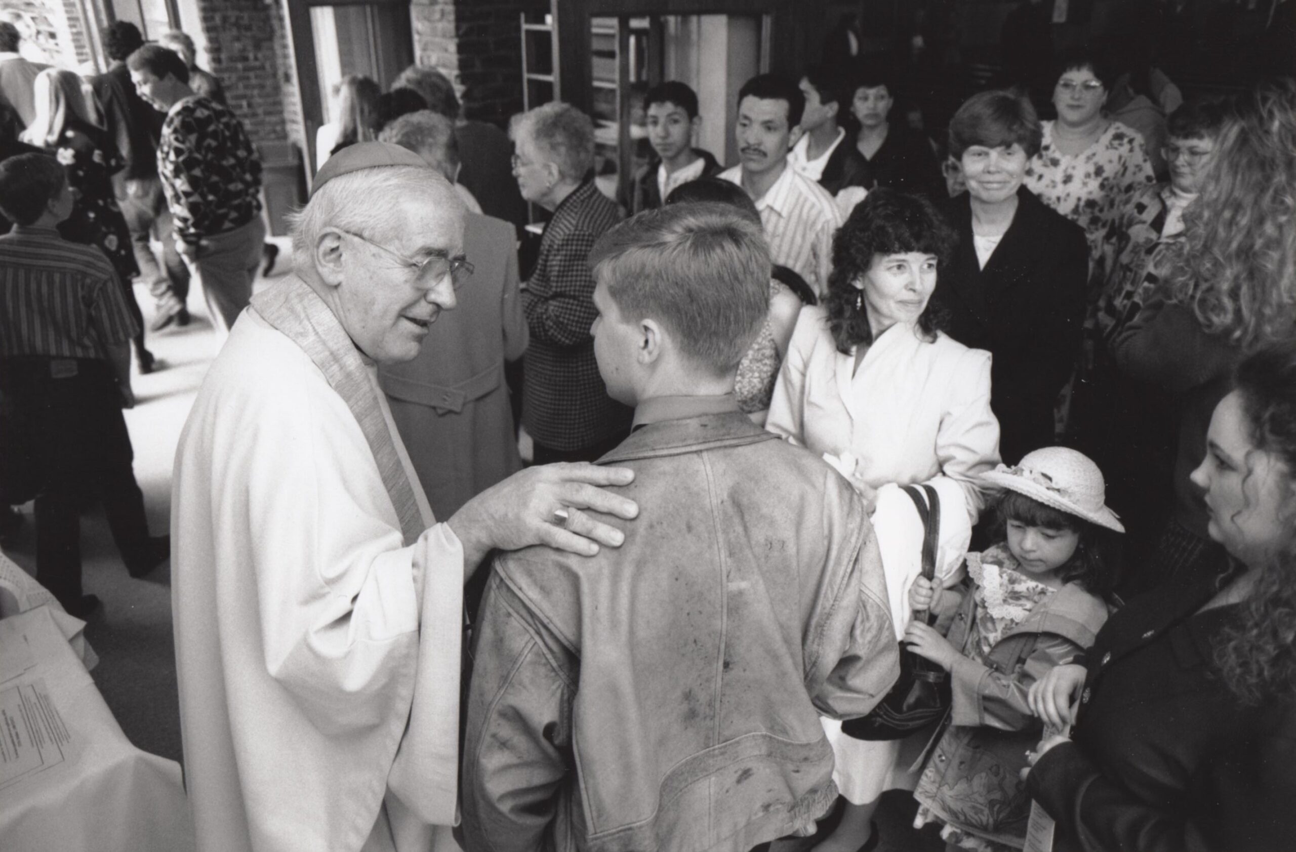 78-AM-converses-with-a-young-man-after-mass